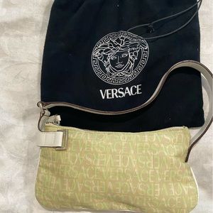 Versace small 8” x 4” purse. Slightly used